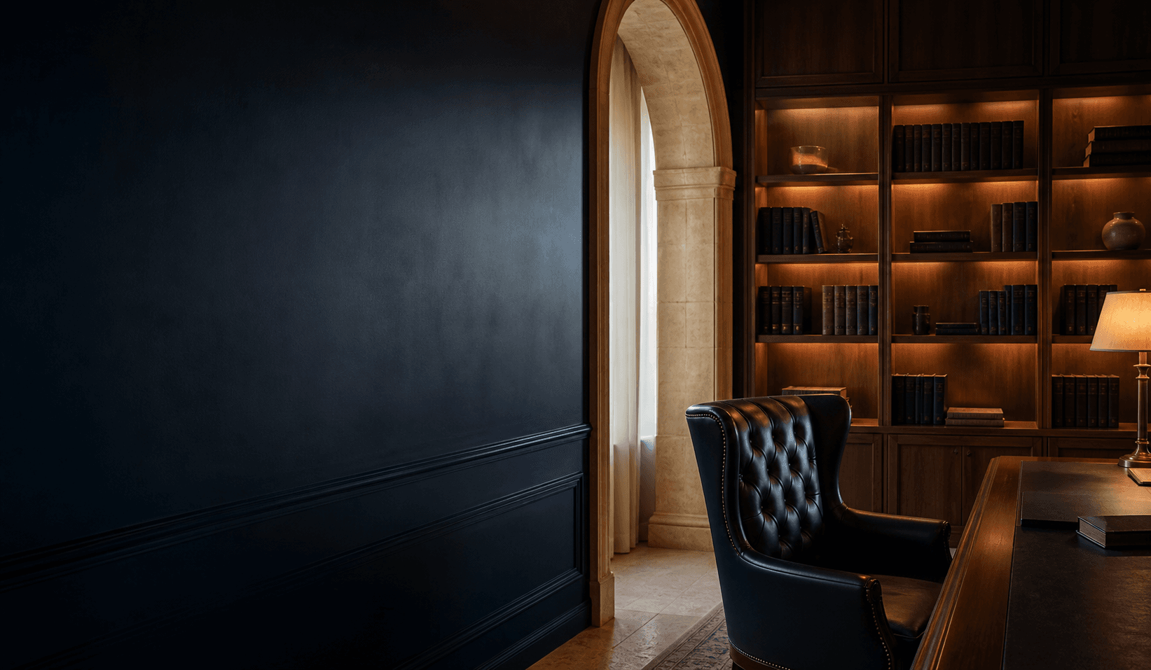 Unoccupied Malta legal office with a limestone arch and walnut library