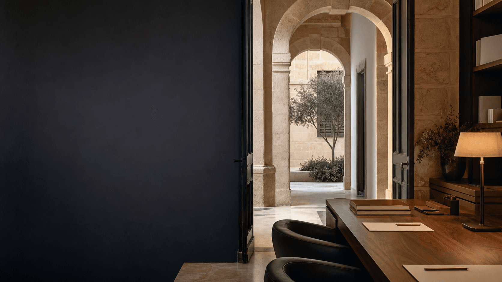 Unoccupied Malta legal office opening through a limestone colonnade